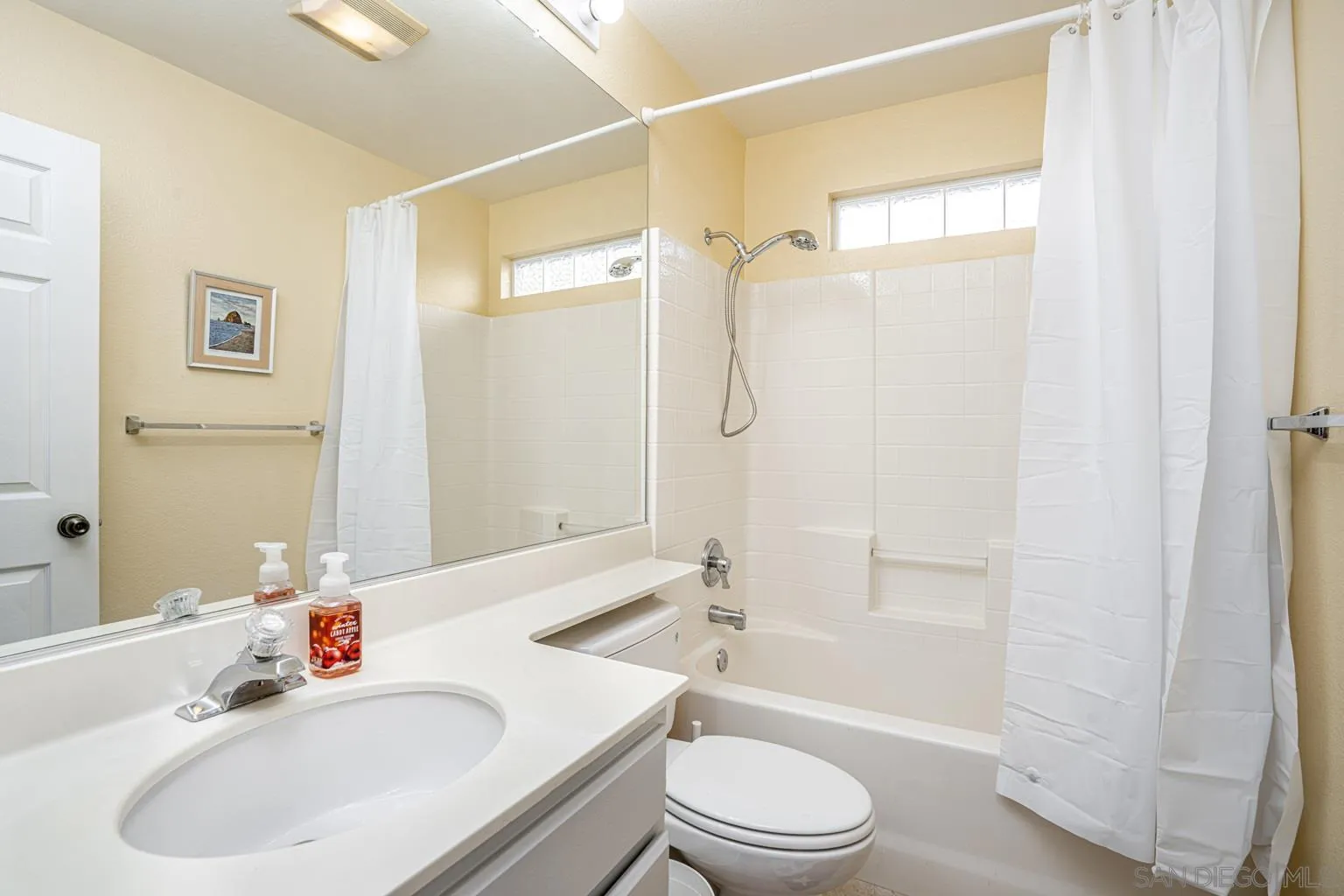 2602 Columbine Road Alpine, CA 91901 - Photo 15 of 38 a bathroom with a sink toilet and shower