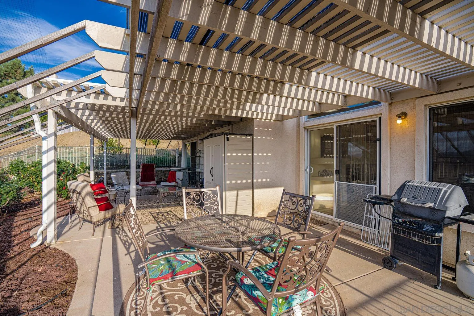 2602 Columbine Road Alpine, CA 91901 - Photo 21 of 38 a view of a chairs and table in patio with a patio