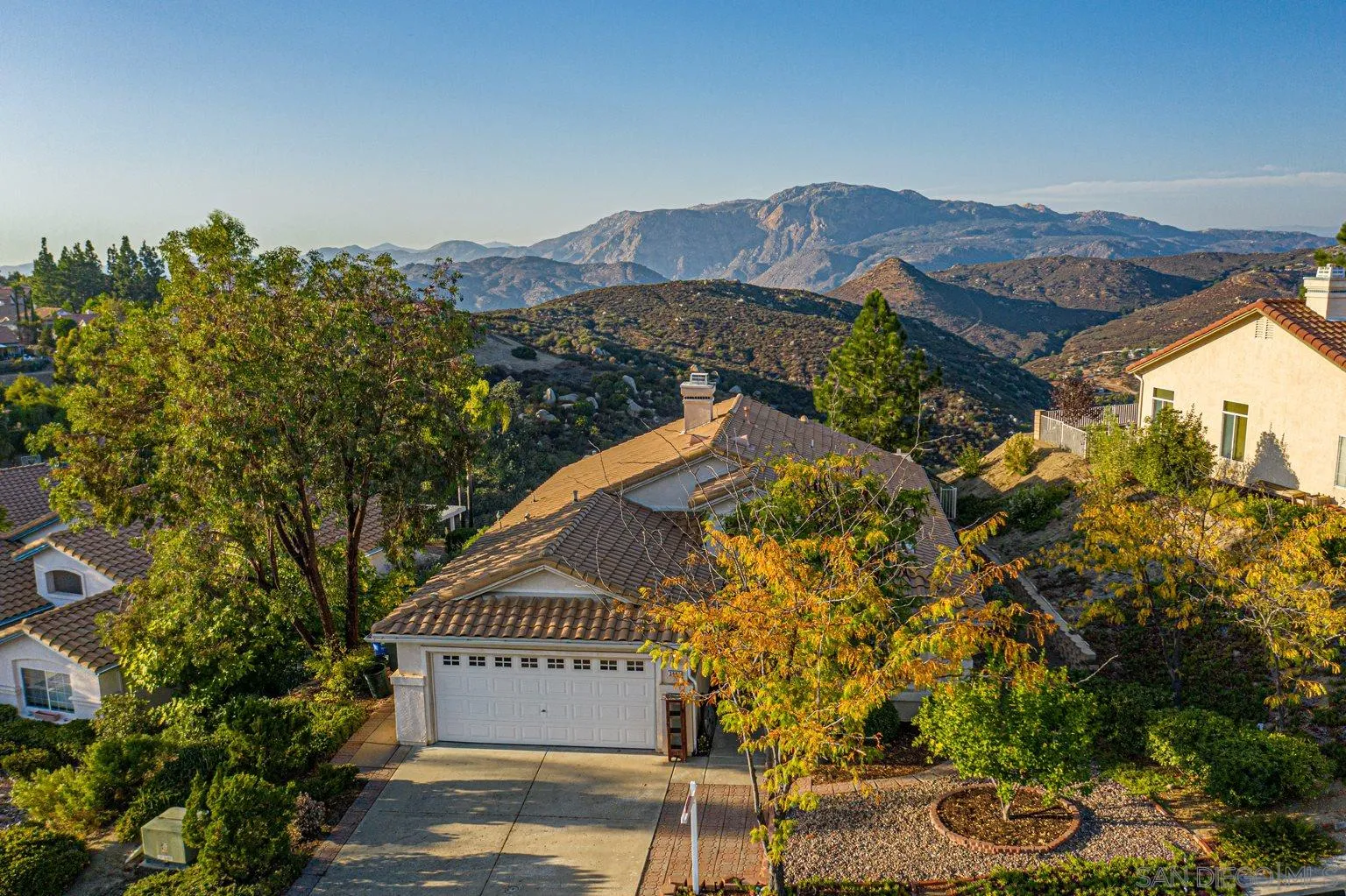 2602 Columbine Road Alpine, CA 91901 - Photo 28 of 38 a view of a swimming pool with a house in the background