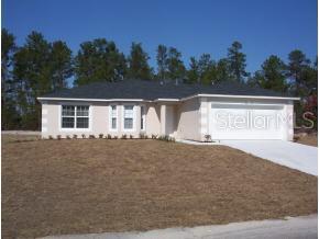 3355 Southwest 176th Street Ocala, FL 34473 - Photo 1 of 1 a front view of a house with trees