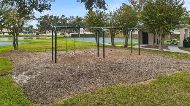 a view of a park with swings