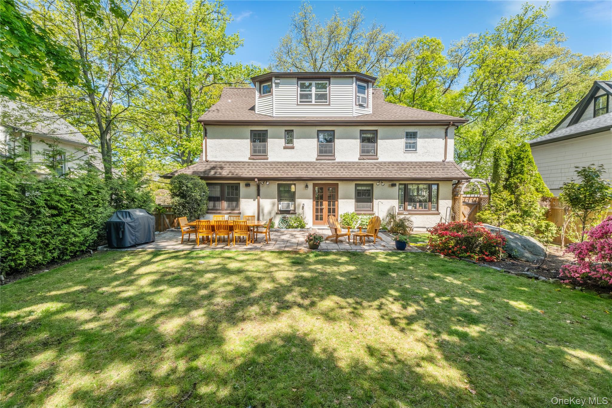 Large private backyard with sunny southern exposure.