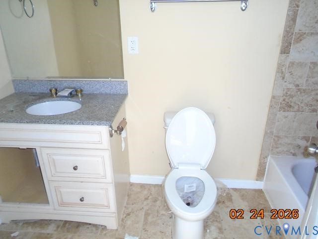 3034 Bradley Farm Road Tappahannock, VA 22560 - Photo 13 of 14 Bathroom featuring vanity and toilet