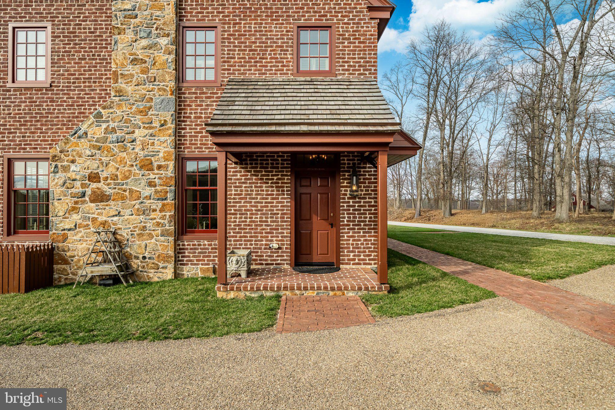 202 Privet Lane Elverson, PA 19520 - Photo 13 of 78 a front view of a house with garden