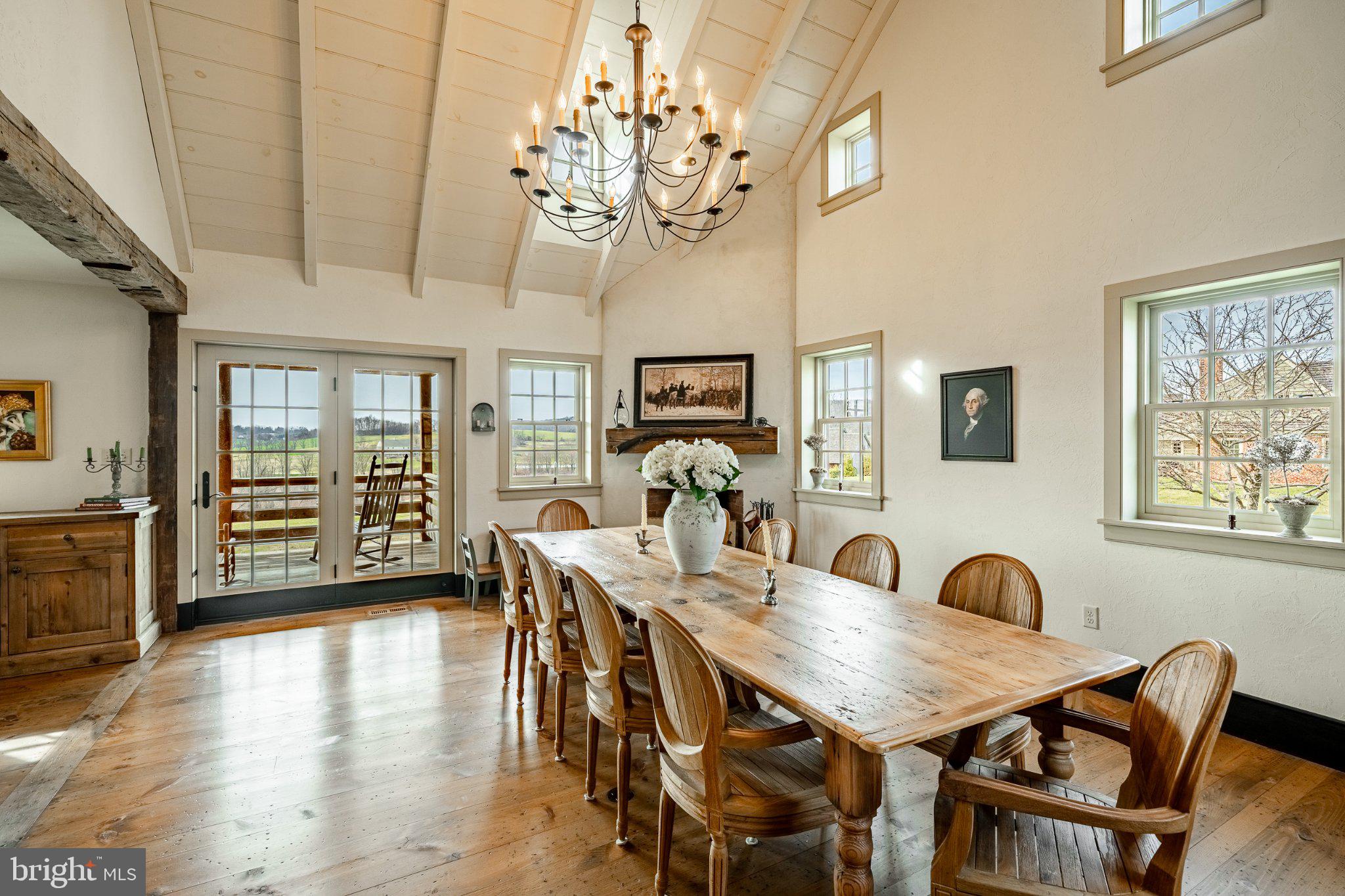202 Privet Lane Elverson, PA 19520 - Photo 32 of 78 a view of a dining room with furniture wooden floor and chandelier