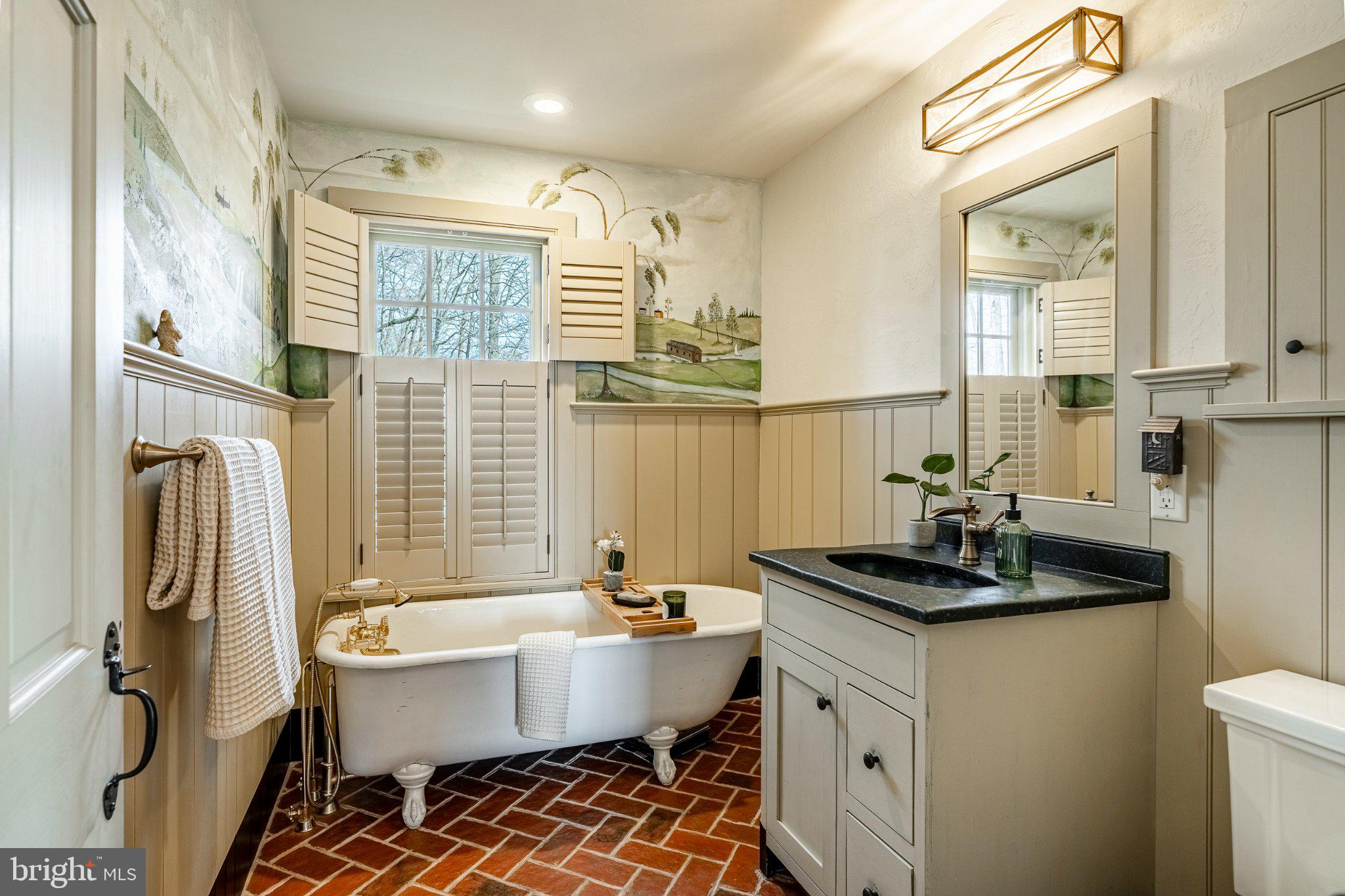 202 Privet Lane Elverson, PA 19520 - Photo 40 of 78 a bathroom with a granite countertop sink and a mirror