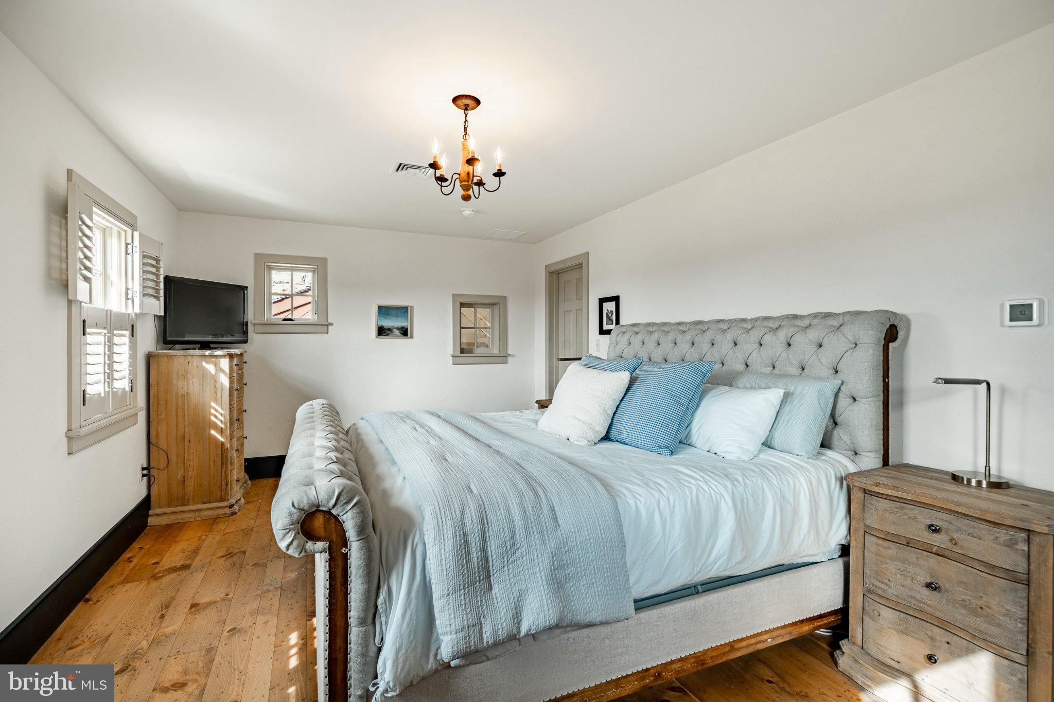 202 Privet Lane Elverson, PA 19520 - Photo 50 of 78 Serene bedroom with rustic charm.