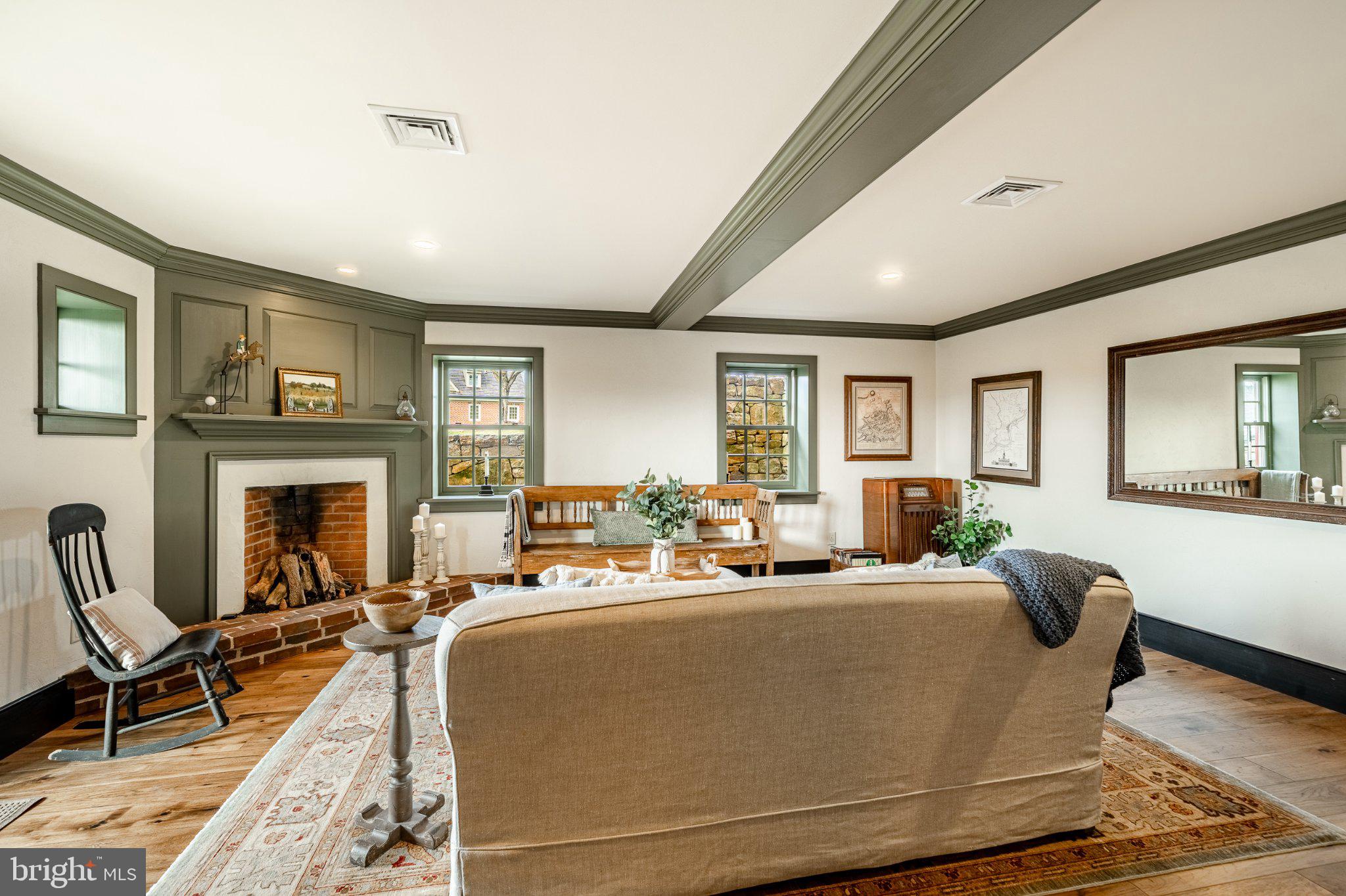 202 Privet Lane Elverson, PA 19520 - Photo 61 of 78 a living room with furniture and a fireplace