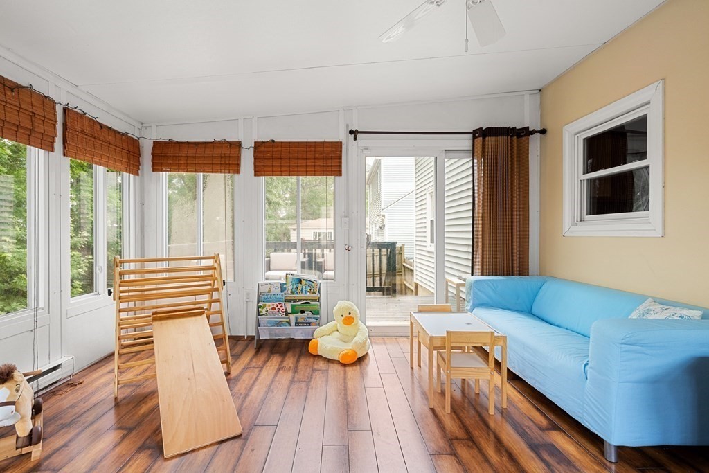 63 Hallron Street Boston, MA 02136 - Photo 11 of 32 a living room with furniture and a large window