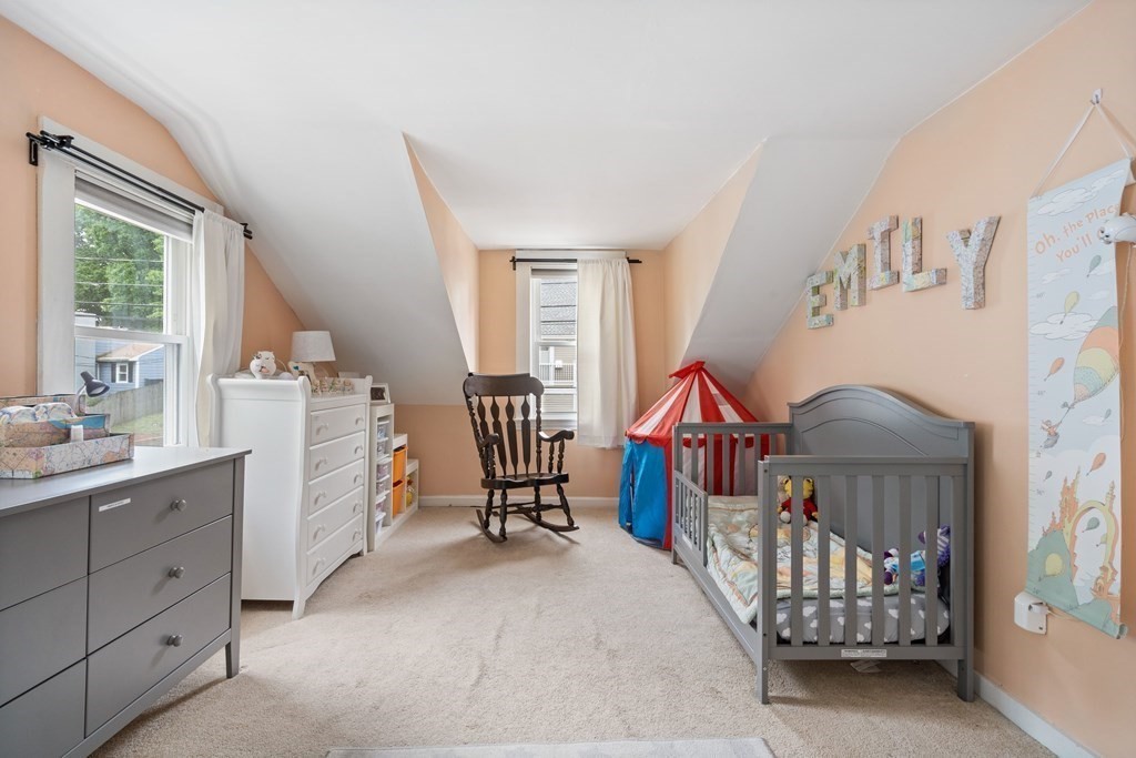63 Hallron Street Boston, MA 02136 - Photo 20 of 32 a bedroom with furniture and a window
