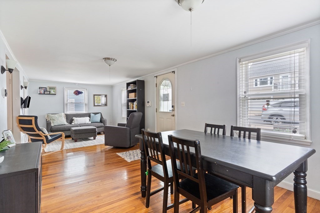63 Hallron Street Boston, MA 02136 - Photo 2 of 32 a view of a dining room with furniture and wooden floor