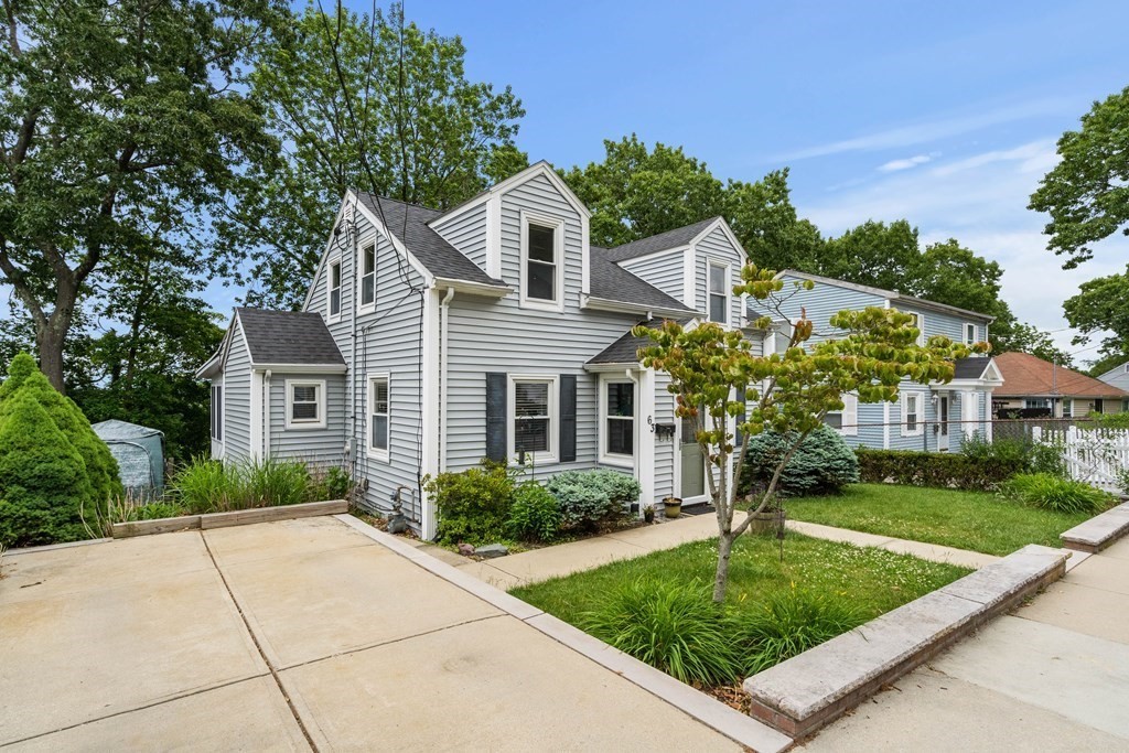 63 Hallron Street Boston, MA 02136 - Photo 29 of 32 a front view of a house with garden