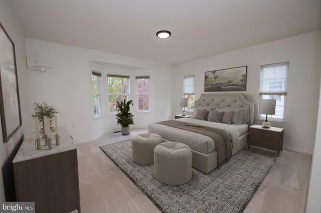 a view of a chandelier in big room and windows