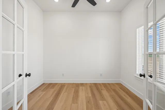 a view of an empty room with a window