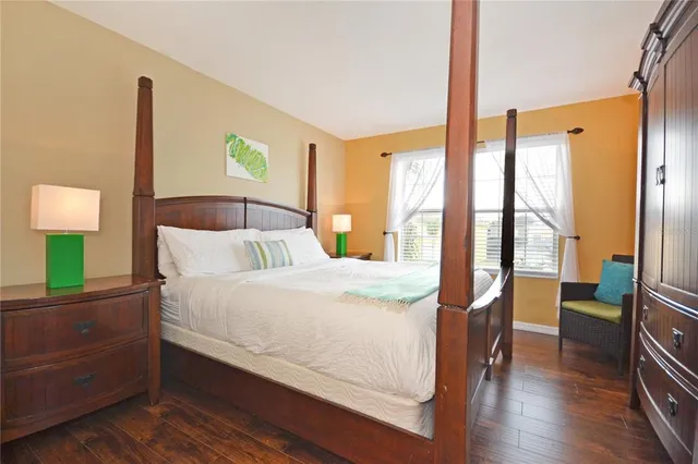 a bedroom with a bed and a cabinets