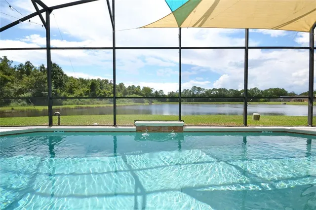 a view of a backyard with a patio