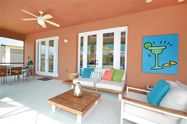 a view of a swimming pool with a patio and a lake view