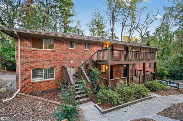 front view of a house with a small yard