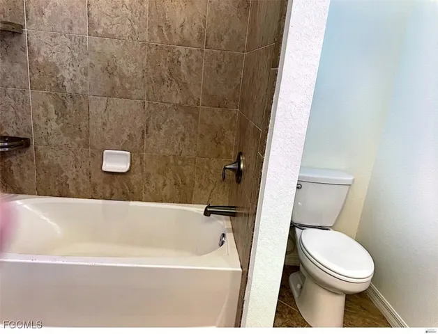 a view of a balcony with a floor to ceiling windows with wooden floor