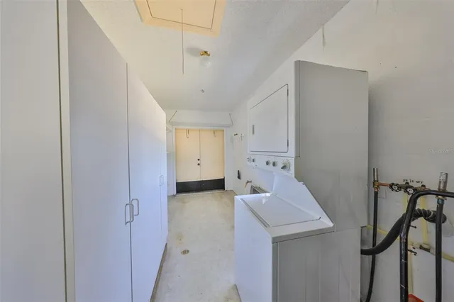 a view of a storage & utility room with utility room