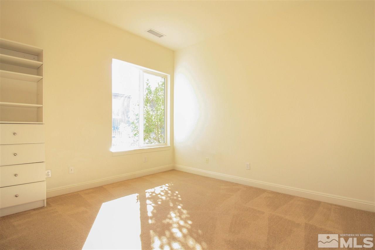 7505 Rough Rock Drive Reno, NV 89502 - Photo 16 of 25 a view of an empty room and window