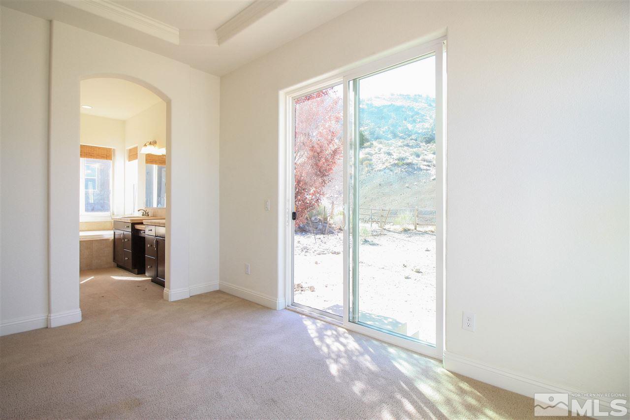7505 Rough Rock Drive Reno, NV 89502 - Photo 19 of 25 a view of a room with a large window