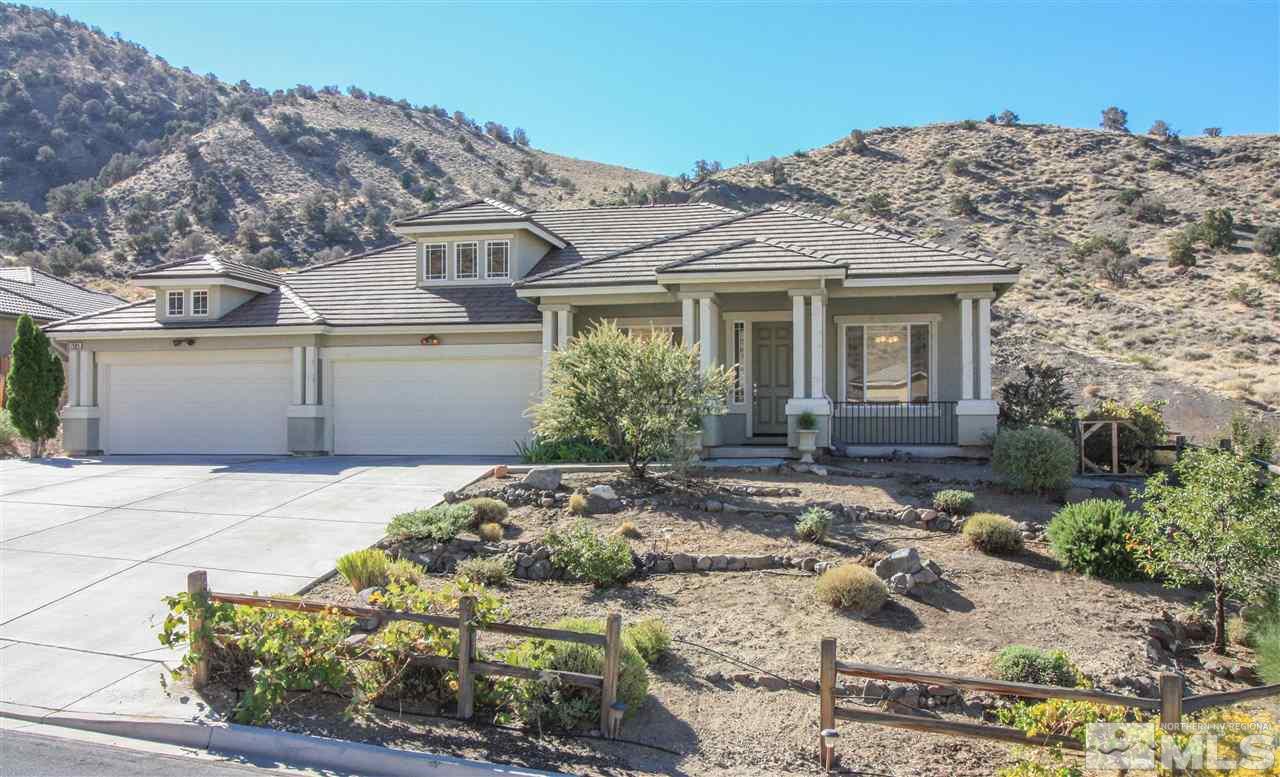 7505 Rough Rock Drive Reno, NV 89502 - Photo 2 of 25 front view of a house with a view of a house