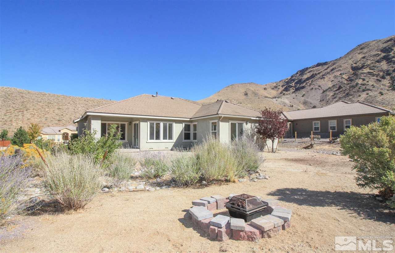 7505 Rough Rock Drive Reno, NV 89502 - Photo 24 of 25 a front view of a house with a yard