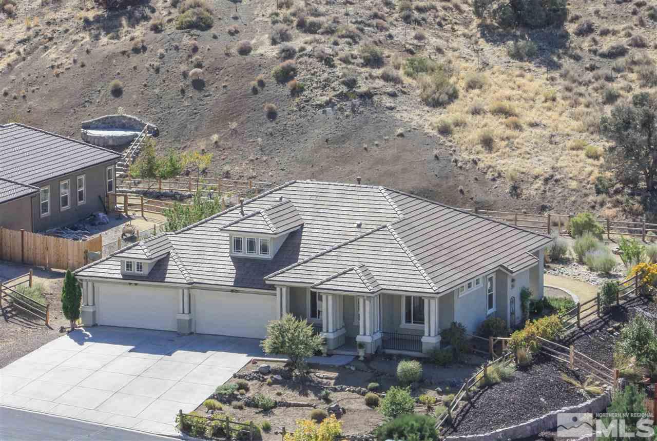 7505 Rough Rock Drive Reno, NV 89502 - Photo 25 of 25 a front view of a house with garden