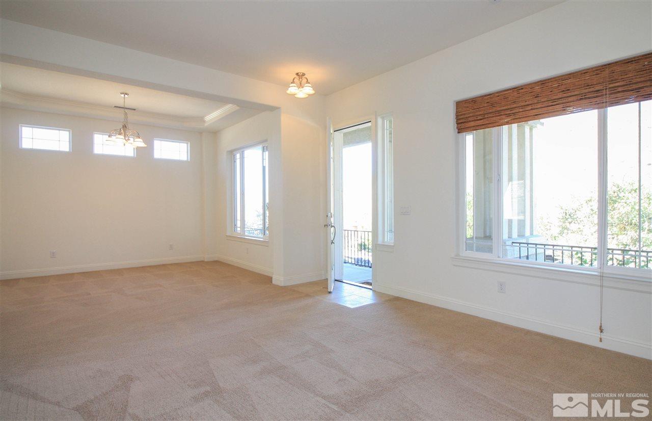 7505 Rough Rock Drive Reno, NV 89502 - Photo 6 of 25 a view of an empty room with a window