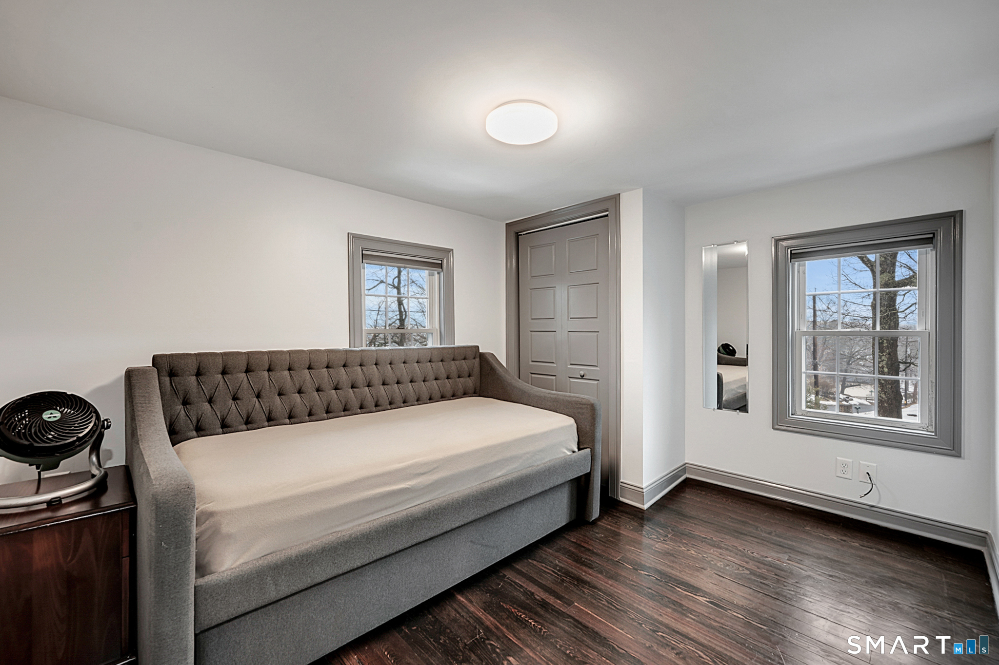 219 Prospect Avenue Meriden, CT 06451 - Photo 15 of 30 a large bed sitting in a bedroom next to a window