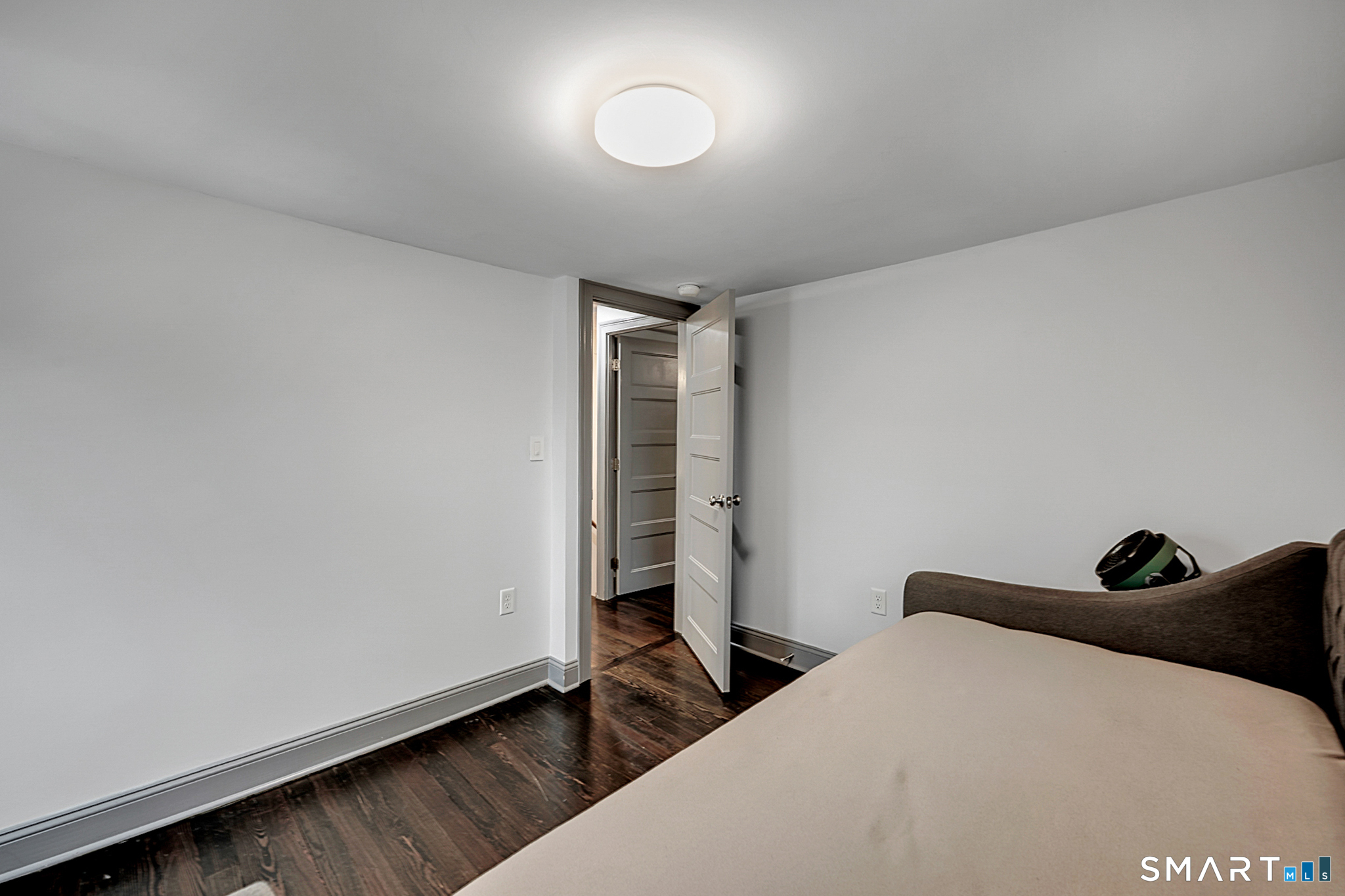 219 Prospect Avenue Meriden, CT 06451 - Photo 16 of 30 a bedroom with a bed and a window