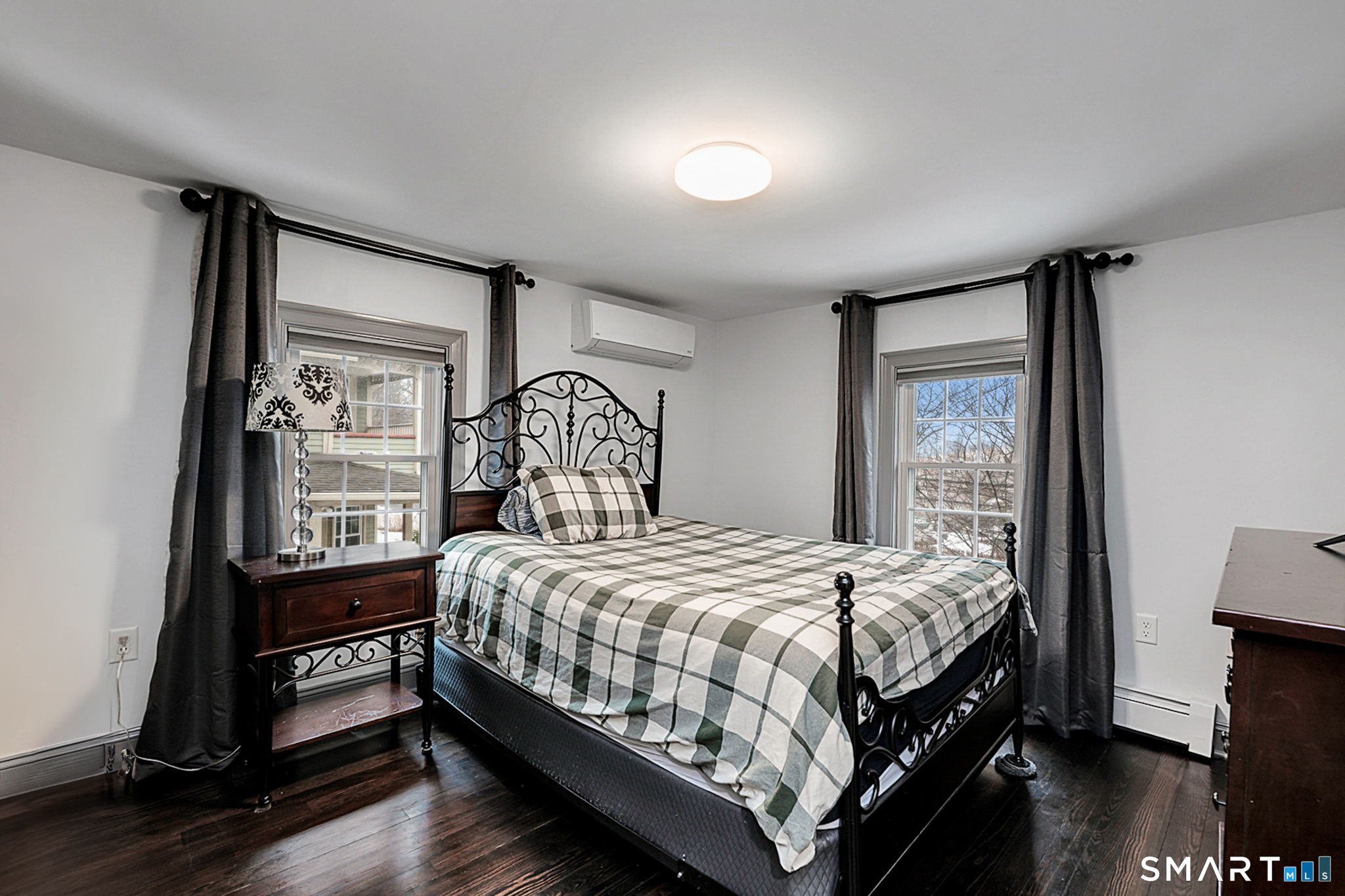 219 Prospect Avenue Meriden, CT 06451 - Photo 17 of 30 a bedroom with a bed and a window