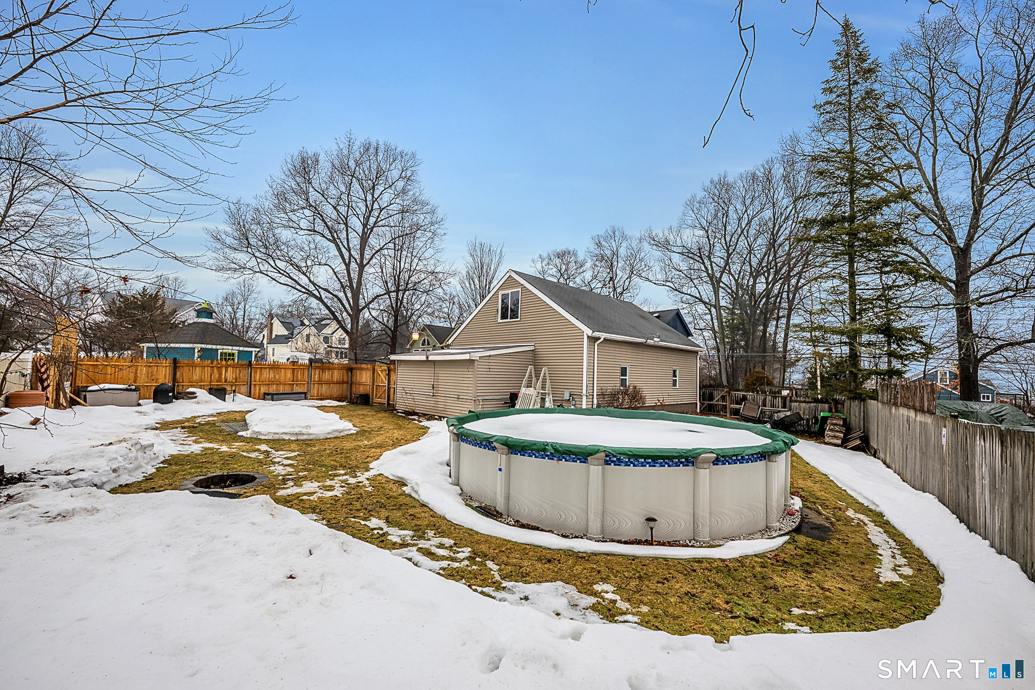 219 Prospect Avenue Meriden, CT 06451 - Photo 23 of 30 a view of a house with snow on the side of the road