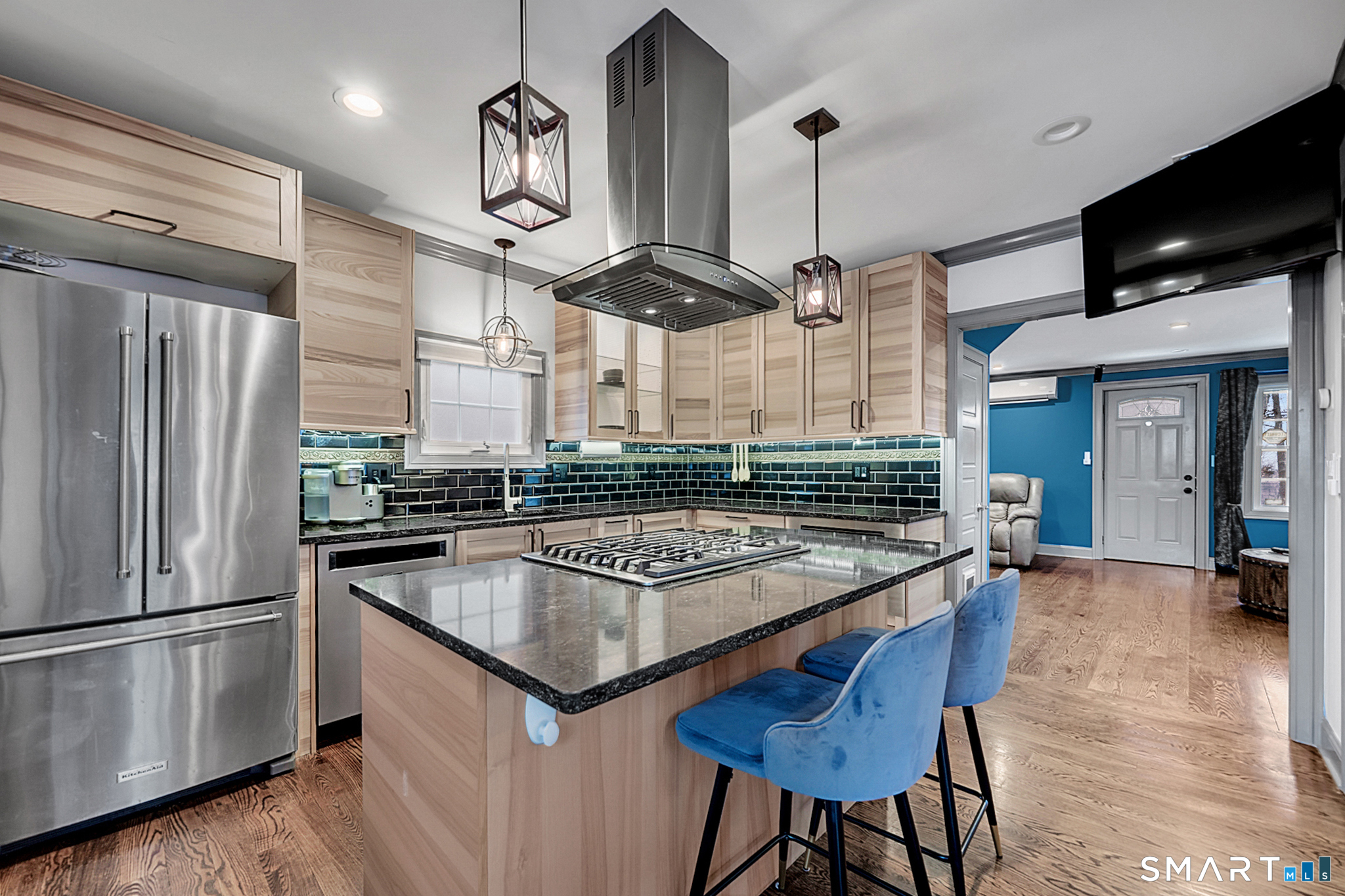 219 Prospect Avenue Meriden, CT 06451 - Photo 4 of 30 a kitchen with stainless steel appliances granite countertop a sink a stove and a wooden floors