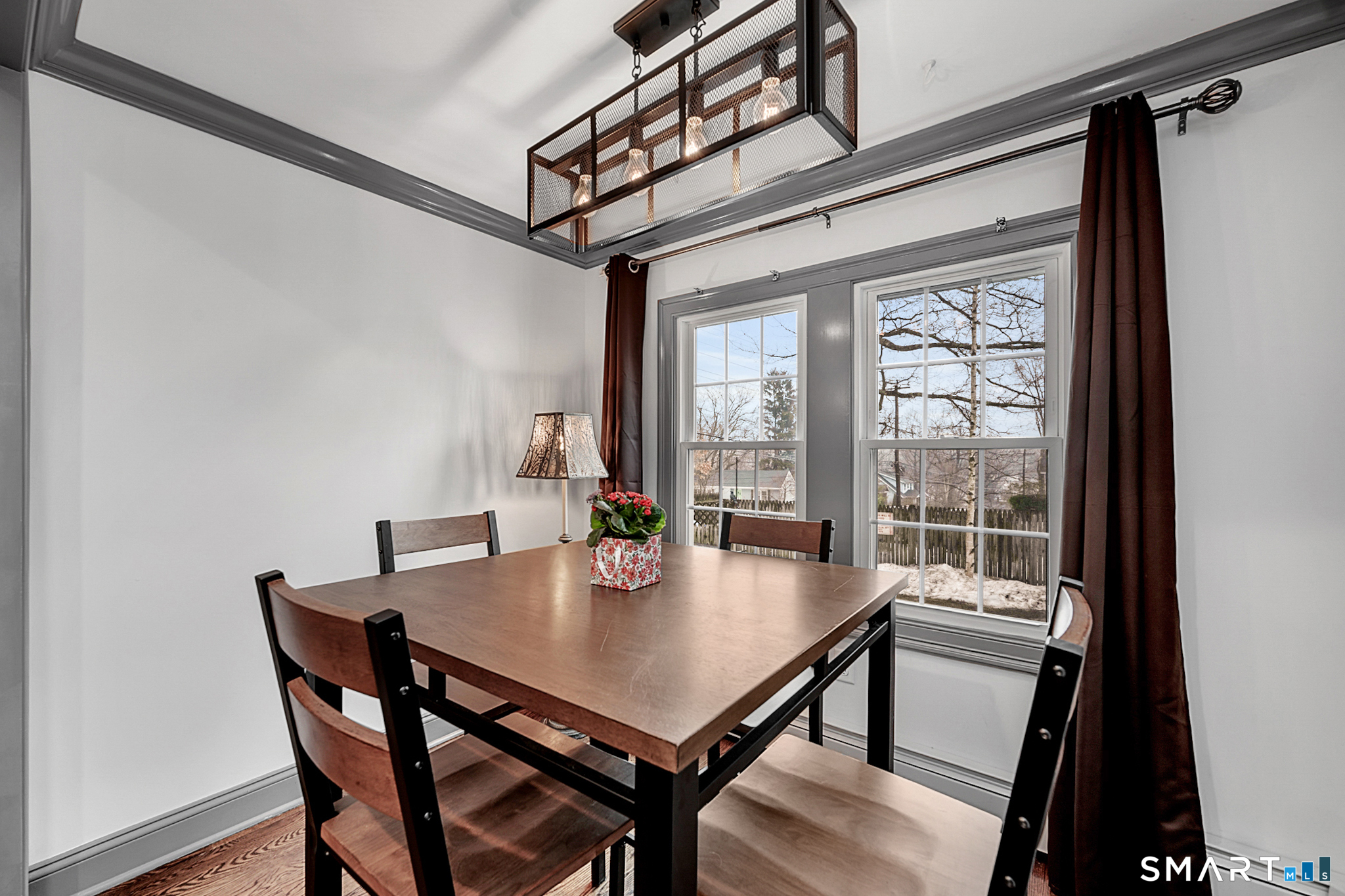 219 Prospect Avenue Meriden, CT 06451 - Photo 7 of 30 a view of a dining room with furniture window and wooden floor