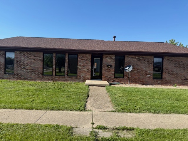 806 Four Seasons Road Bloomington, IL 61701 - Photo 1 of 23 a view of a house with a garden