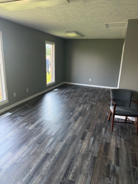 806 Four Seasons Road Bloomington, IL 61701 - Photo 11 of 23 a view of an empty room with wooden floor and a window