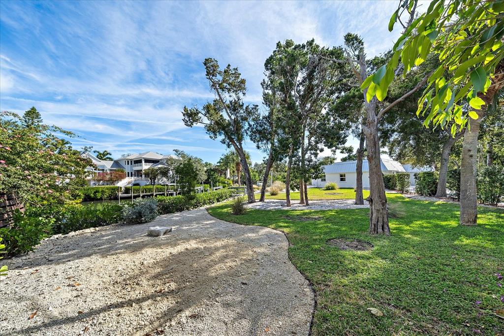 5155 Hidden Harbor Road Sarasota, FL 34242 - Photo 14 of 56 a view of a park with large trees