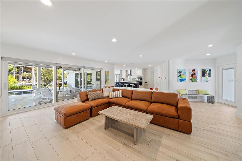 5155 Hidden Harbor Road Sarasota, FL 34242 - Photo 24 of 56 a living room with furniture and a large window