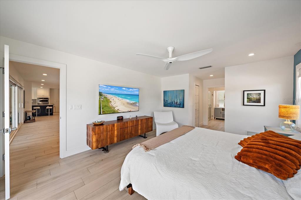 5155 Hidden Harbor Road Sarasota, FL 34242 - Photo 28 of 56 a bedroom with furniture and wooden floor