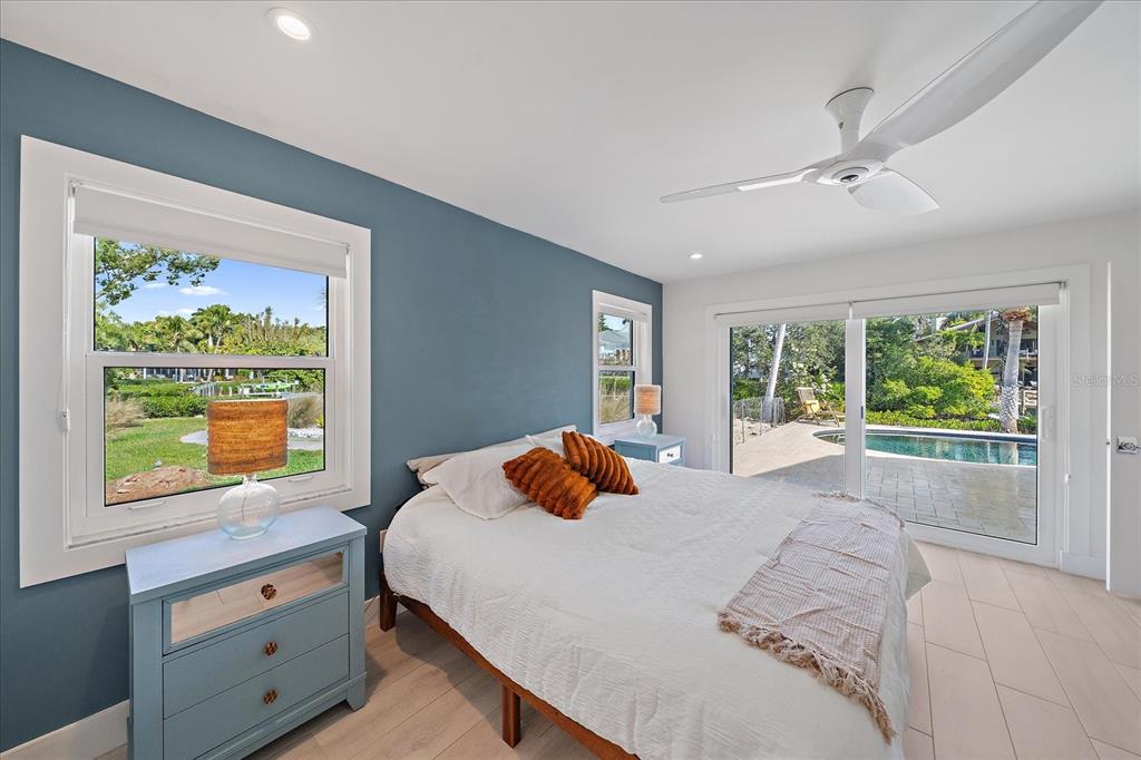 5155 Hidden Harbor Road Sarasota, FL 34242 - Photo 29 of 56 a bedroom with a bed and window