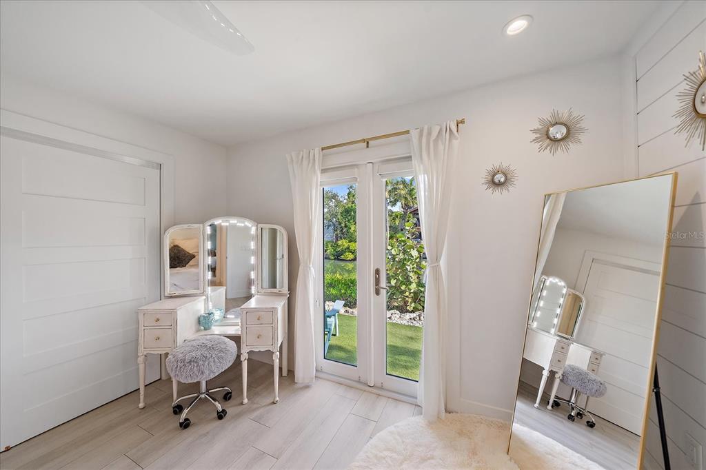 5155 Hidden Harbor Road Sarasota, FL 34242 - Photo 34 of 56 a living room with furniture and a window