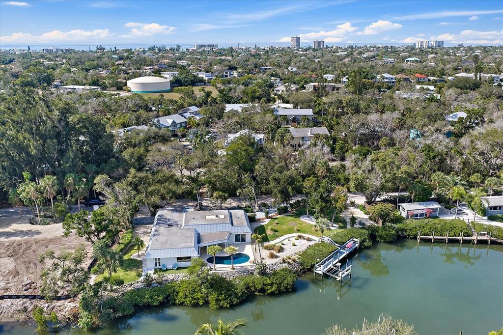 5155 Hidden Harbor Road Sarasota, FL 34242 - Photo 7 of 56 an aerial view of residential houses with outdoor space