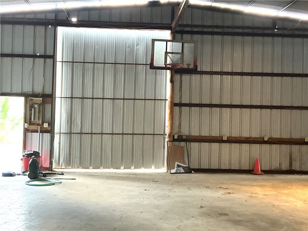 145 Churchill Road Woodsboro, TX 78393 - Photo 10 of 23 Double sliding doors to Workshop
