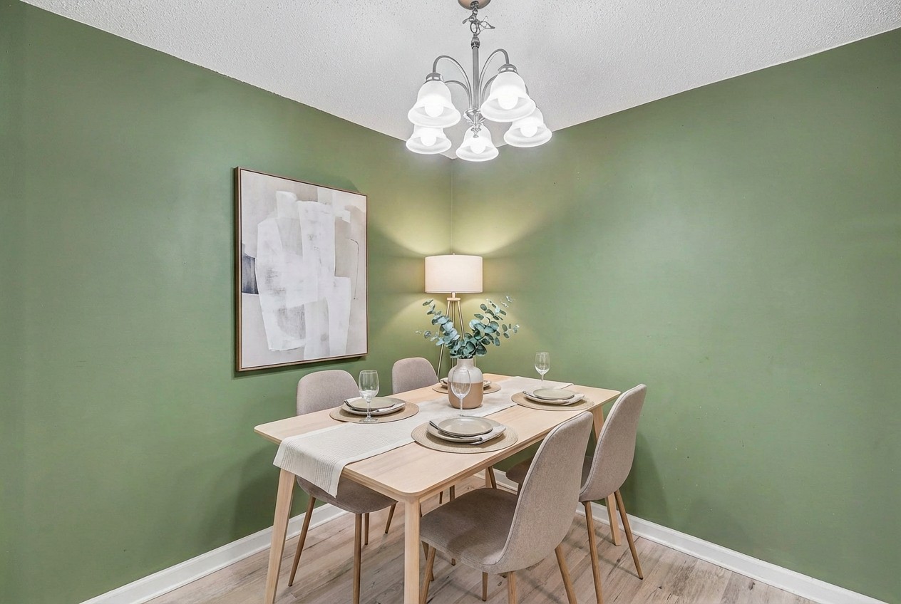 500 Paragon Mills Road, Unit N15 Nashville, TN 37211 - Photo 2 of 11 a view of a dining room with furniture and wooden floor