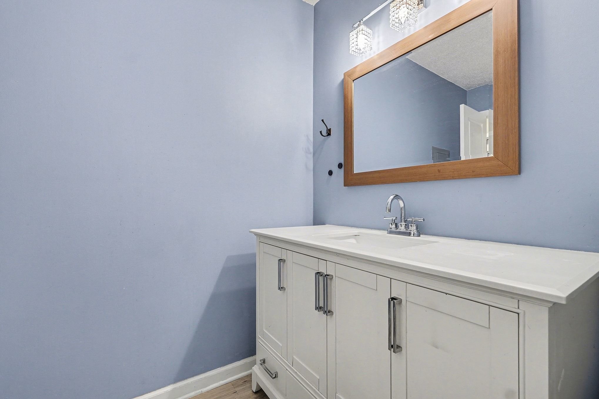 500 Paragon Mills Road, Unit N15 Nashville, TN 37211 - Photo 6 of 11 a bathroom with a sink and a mirror