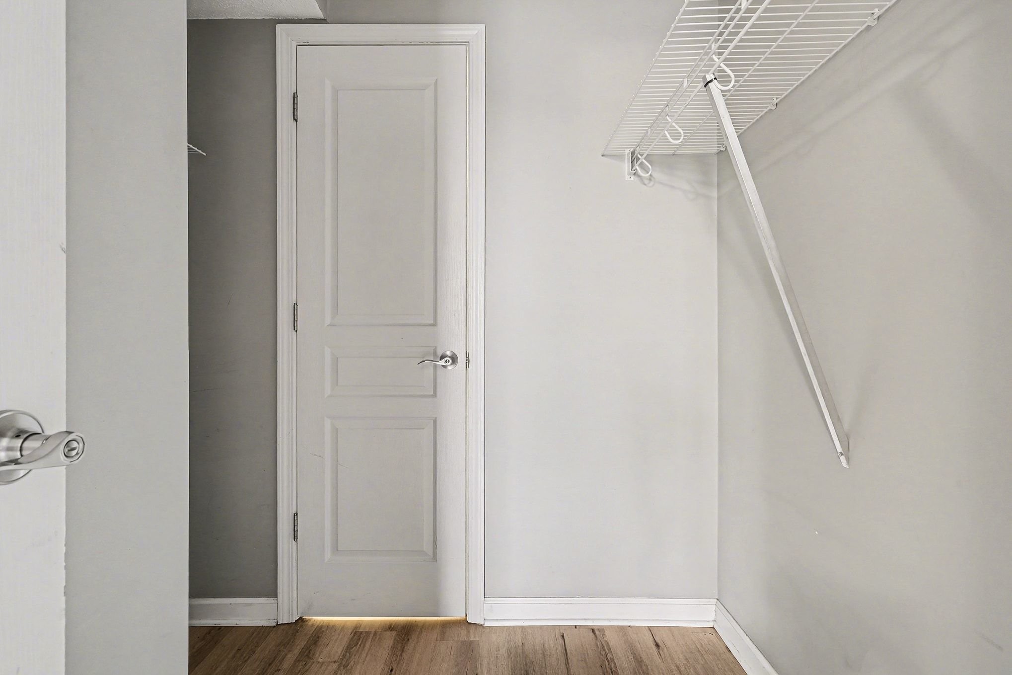 500 Paragon Mills Road, Unit N15 Nashville, TN 37211 - Photo 8 of 11 a view of walk in closet with empty racks