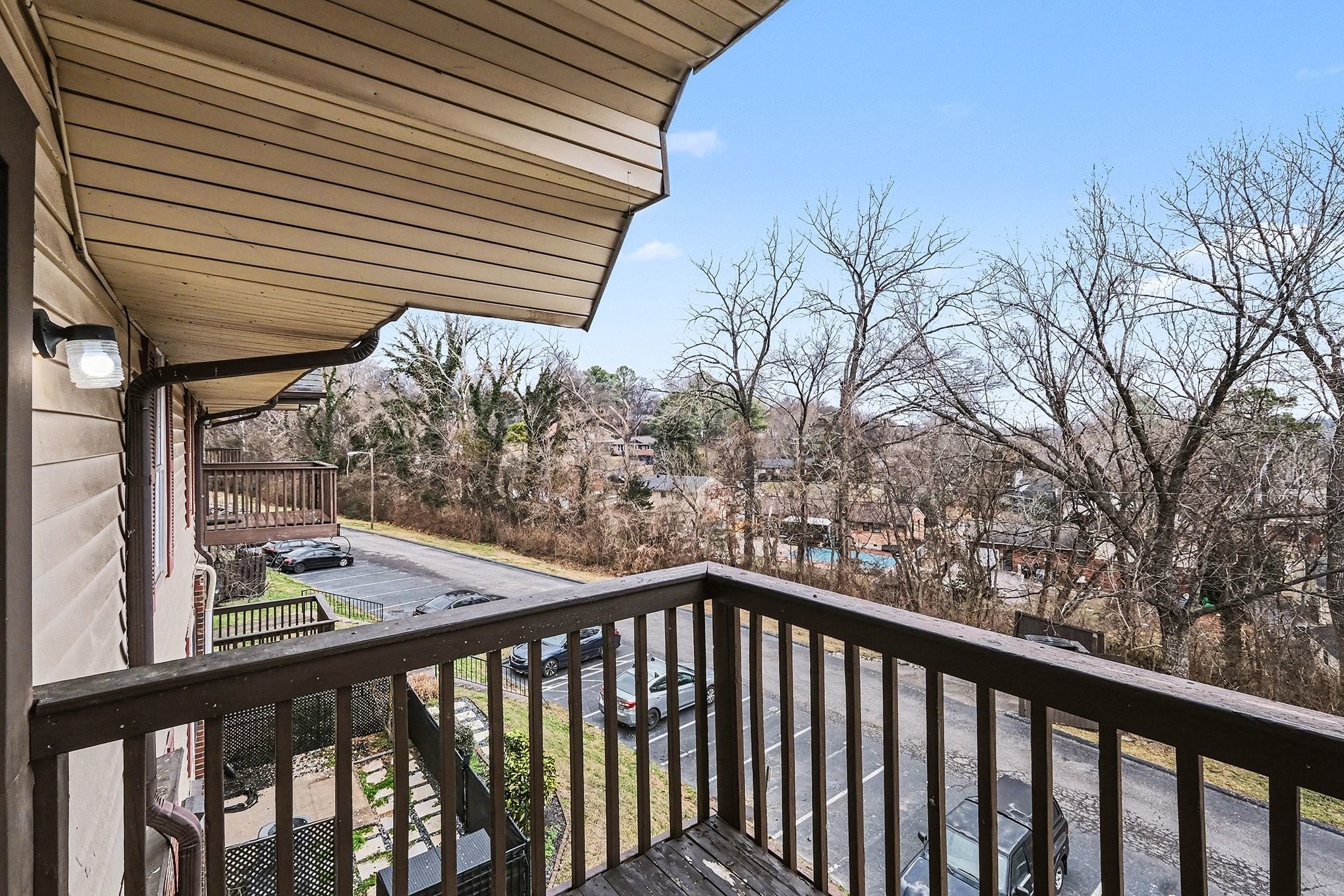 500 Paragon Mills Road, Unit N15 Nashville, TN 37211 - Photo 10 of 11 a view of balcony with wooden floor and fence