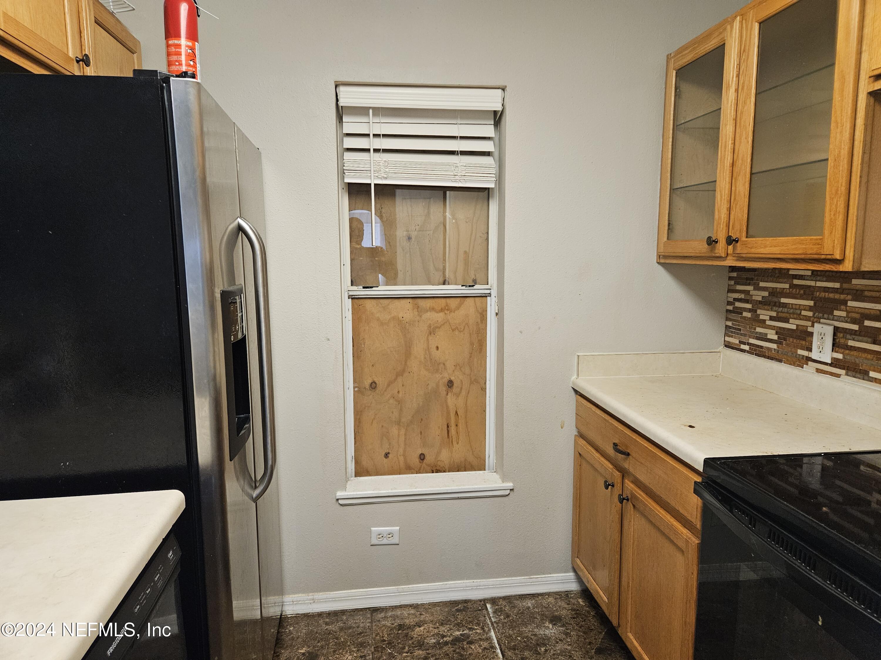 711 Talking Tree Drive Jacksonville, FL 32205 - Photo 19 of 61 a bathroom with a sink a vanity and a mirror